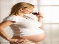 Mums-to-be 'CAN have a glass of wine a day without harming their child's development'