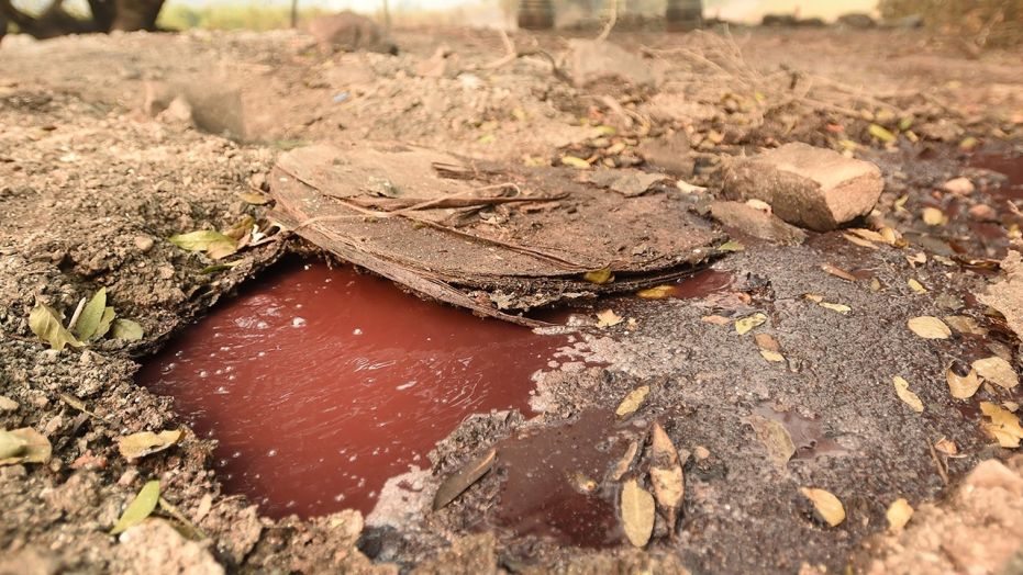 Boiling river of wine flows through burned down California winery